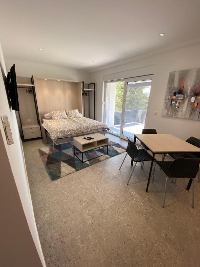 Apartmani Kumenat 比奥格勒·纳·莫鲁 外观 照片